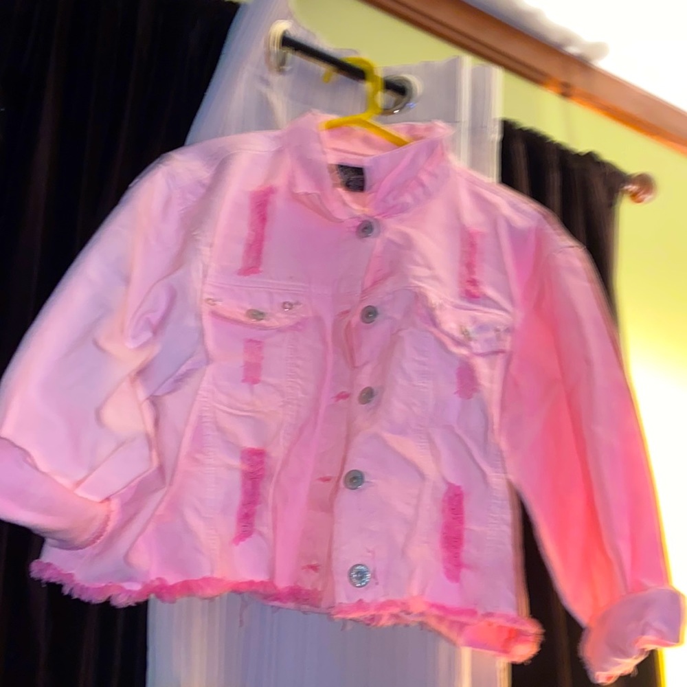 Light pink distressed jean jacket
